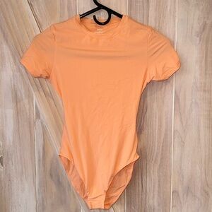 SKIMS Neon Light Orange XS Snatching Bodysuit